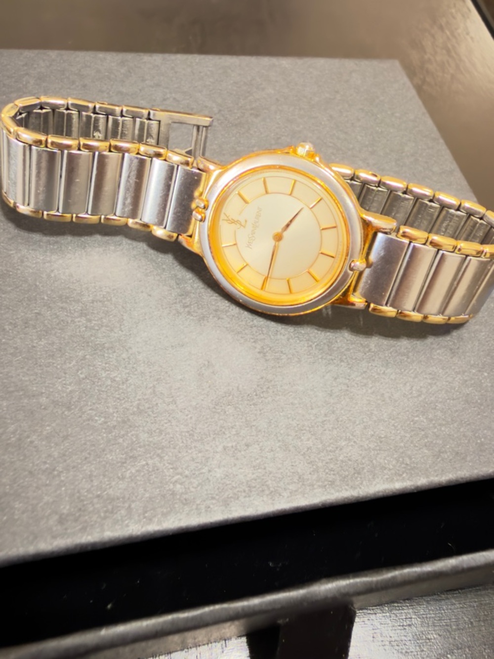 Vintage two-tone (gold & silver) Yves Saint Laurent (YSL) women’s quartz watch.